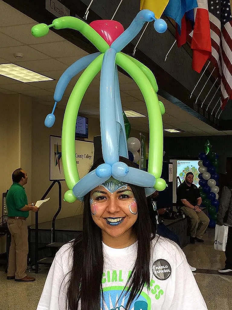 Face Painted Mermaid with Balloon Hat