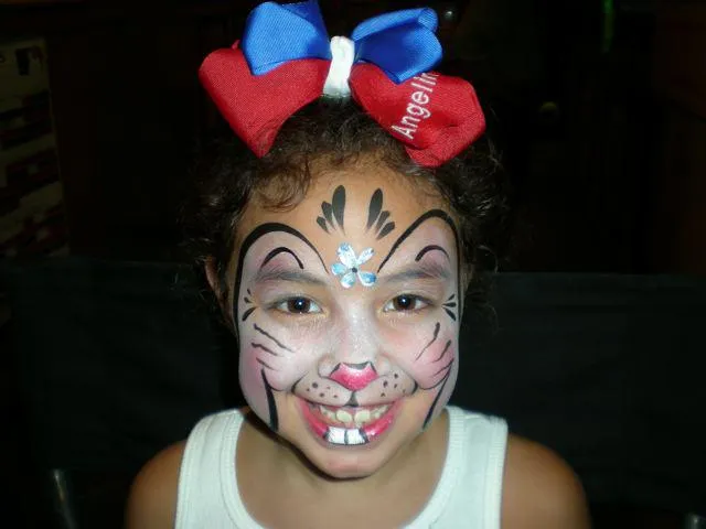 Smiling Bunny Rabbit from Face Painting and Balloons